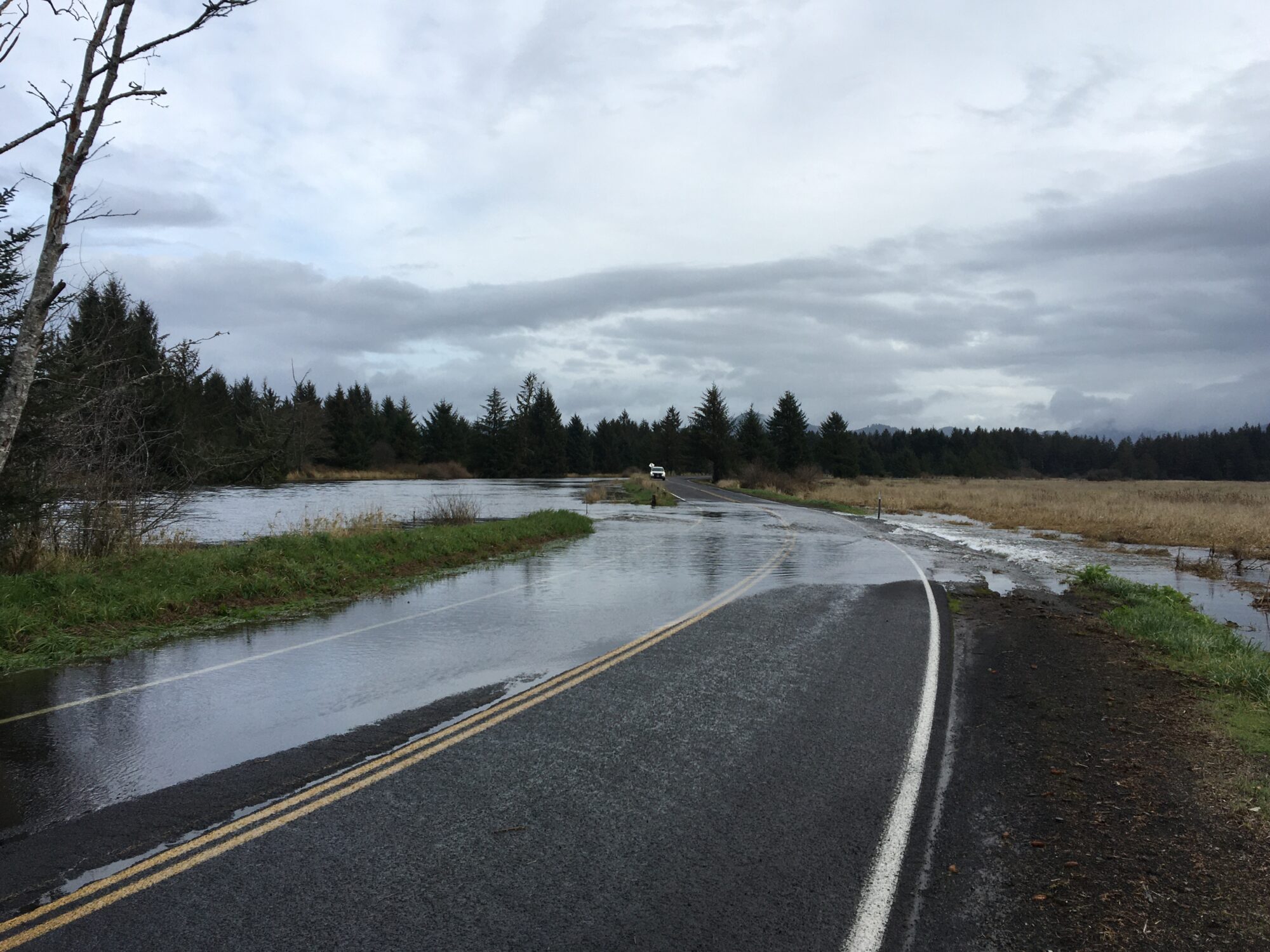 road with water over it